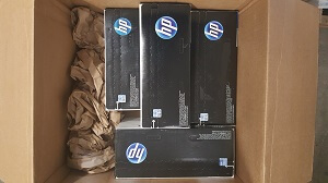 Overbox toner items inside outer shipping carton